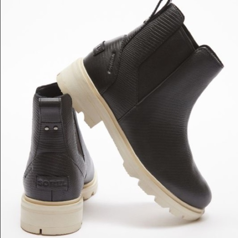 Black leather sorel booties with white soles. Brand new!